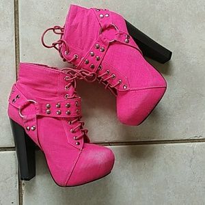Hot pink studded lace-up boots